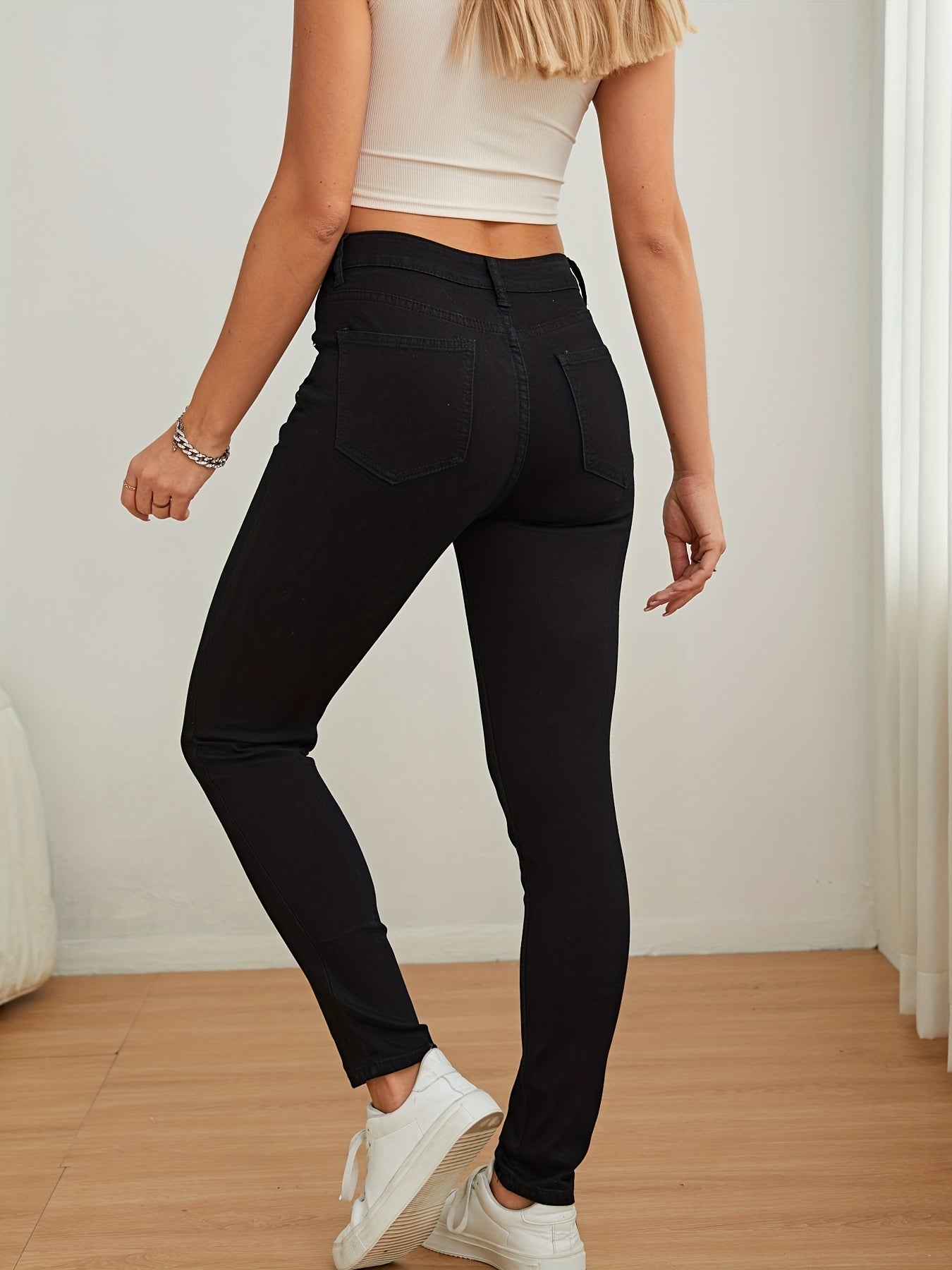 "Hoge taille skinny jeans in effen zwart - Flatterende en veelzijdige keuze" afbeelding 4