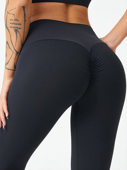 Zwarte scrunchy yoga legging met hoge taille voor optimaal comfort afbeelding 2